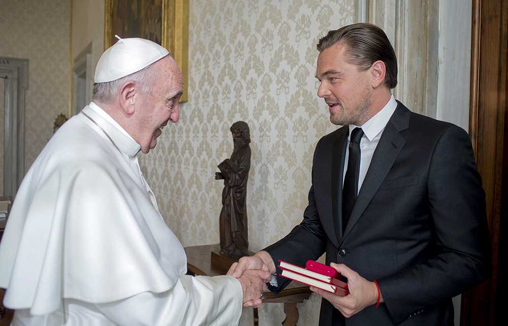 Pope Francis meets with actor Leonardo Di Caprio during a private audience in the pontiff's private studio, at the Vatican, Thursday, Jan. 28, 2016. (L'Osservatore Romano/Pool Photo via AP)