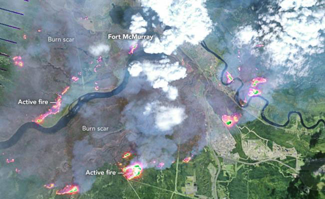 (video) Incendio forestal se propaga a provincia aledaña en Canadá