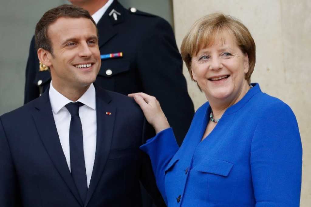 Merkel apoya los planes financieros de Francia