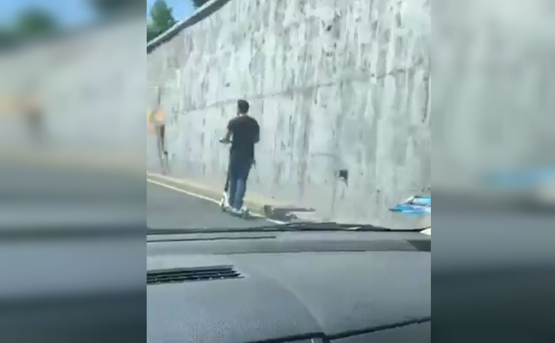 VIDEO: Hombre viaja en un scooter sobre viaducto